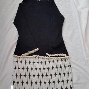 Black sweater with matching skirt